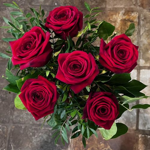 Valentine Red Roses with complimenting Foliage.